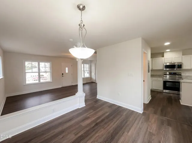 a view of a kitchen with a sink and dishwasher