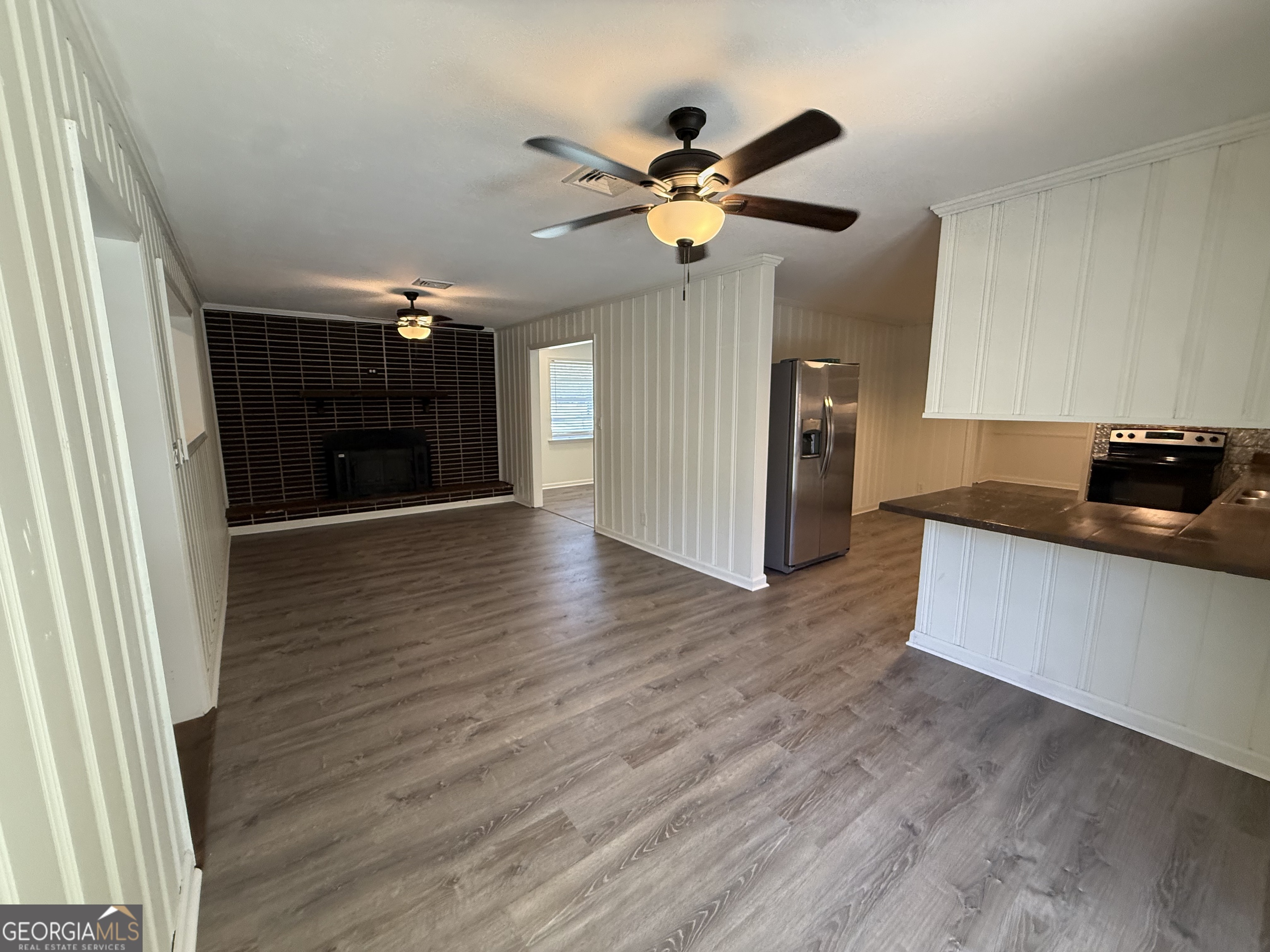 108 Plum Street Dublin, GA 31021 - Photo 26 of 33 a view of a livingroom with a chandelier