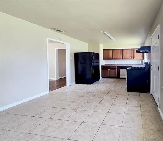 a view of a kitchen with a sink