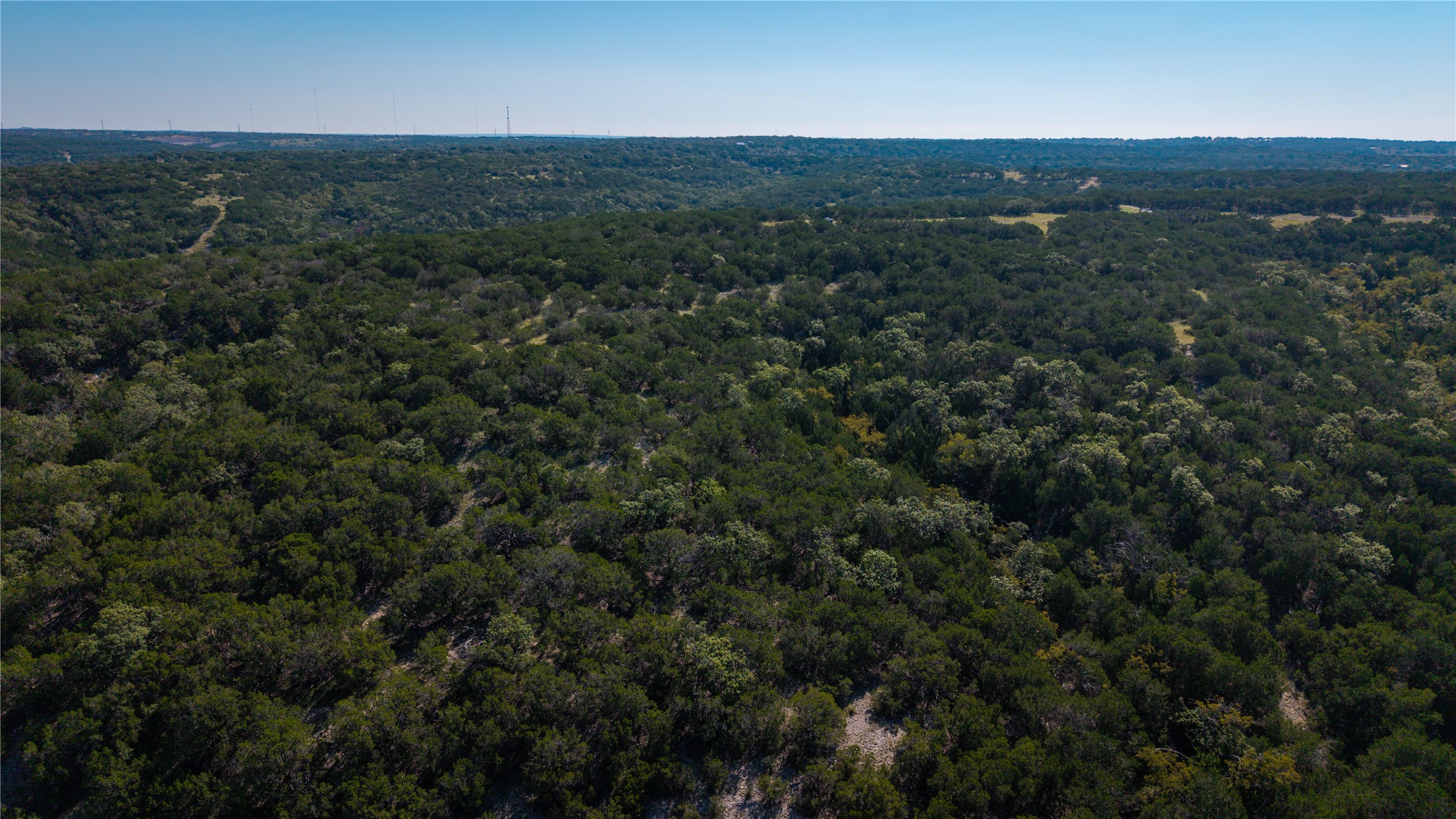 150 Henderson Branch Road West Ingram, TX 78025 - Photo 18 of 35 an aerial view of residential houses with outdoor space and trees