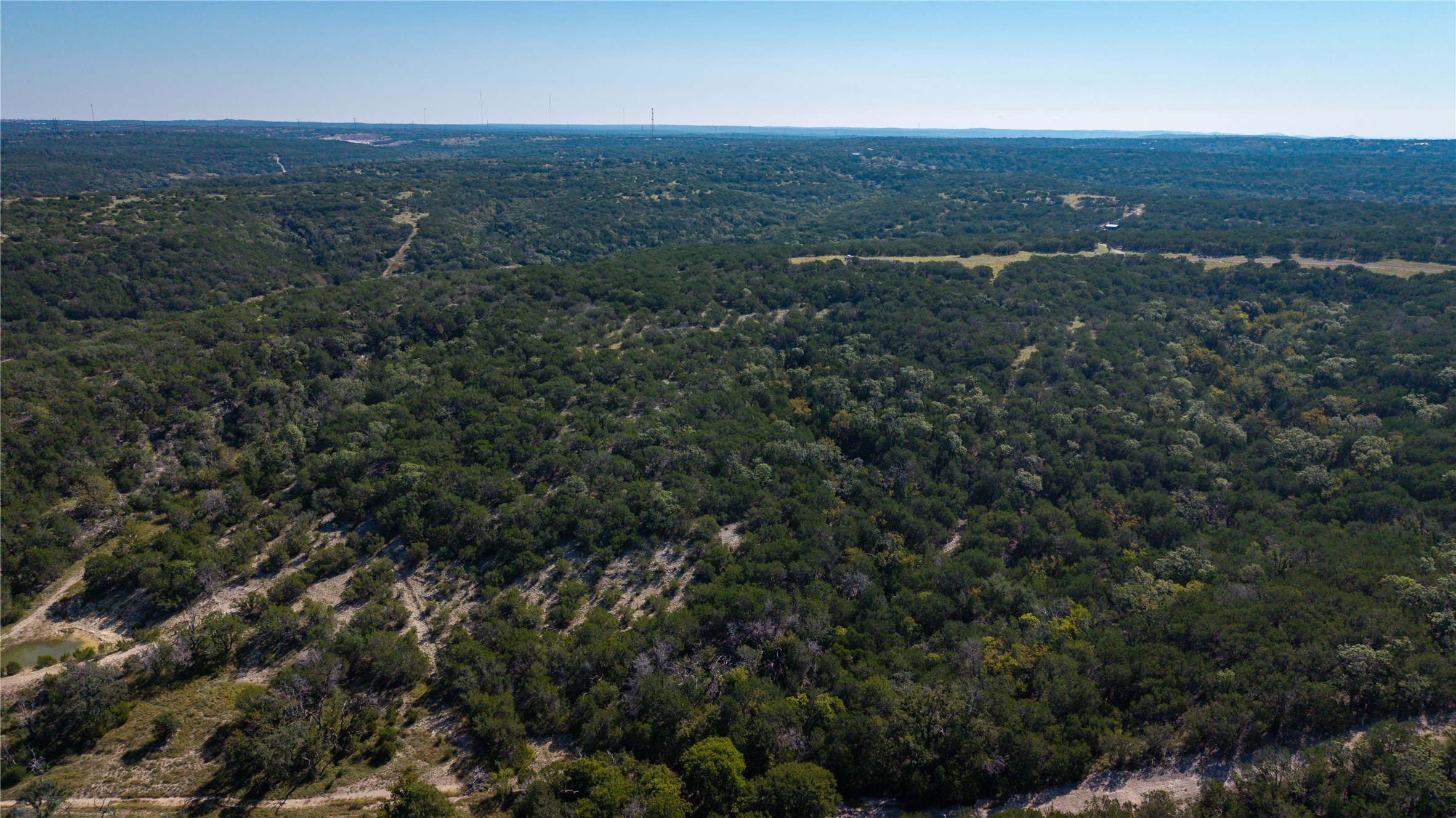 150 Henderson Branch Road West Ingram, TX 78025 - Photo 19 of 35 an aerial view of house with yard