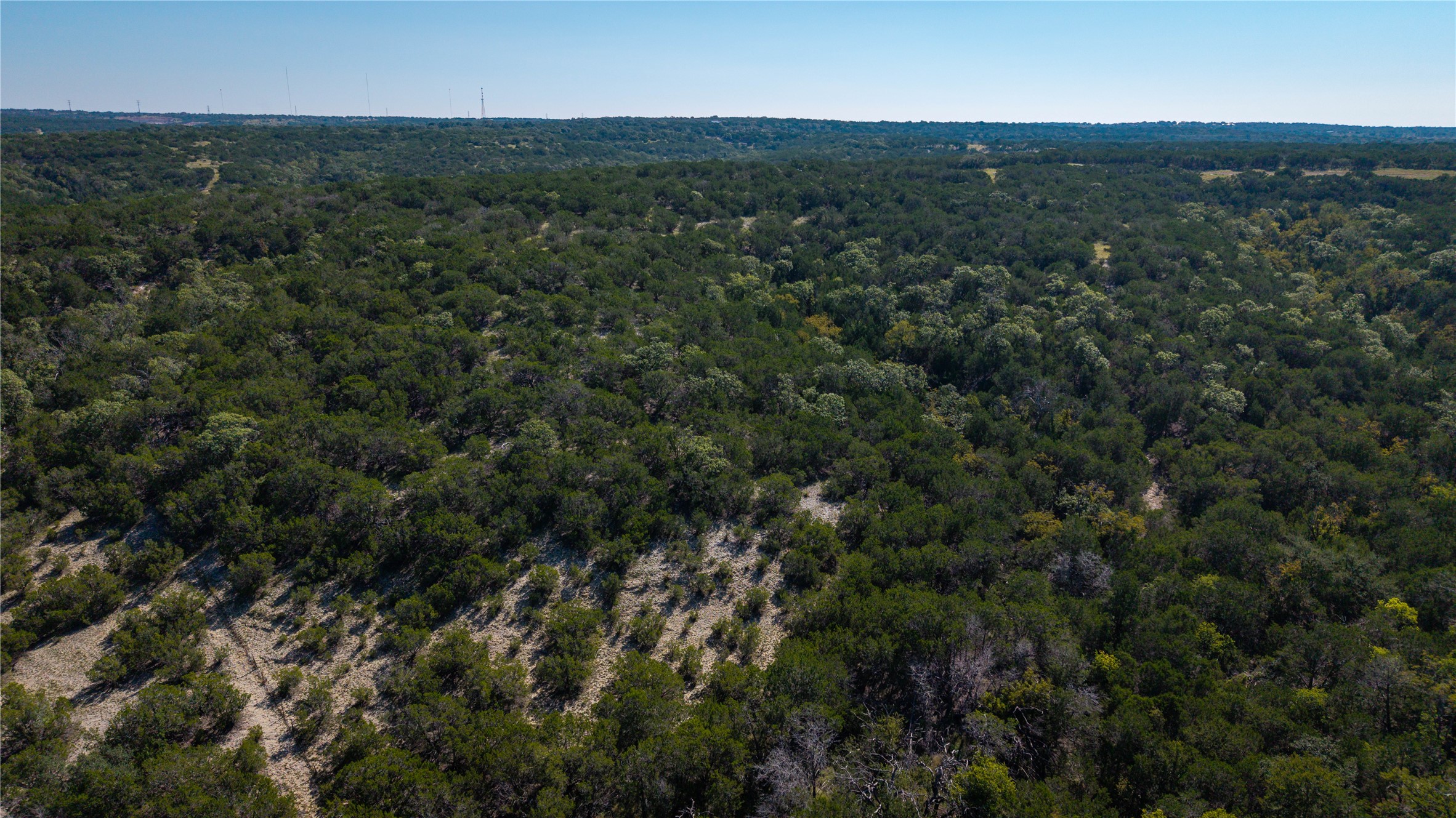 150 Henderson Branch Road West Ingram, TX 78025 - Photo 20 of 35 an aerial view of residential houses with outdoor space and trees