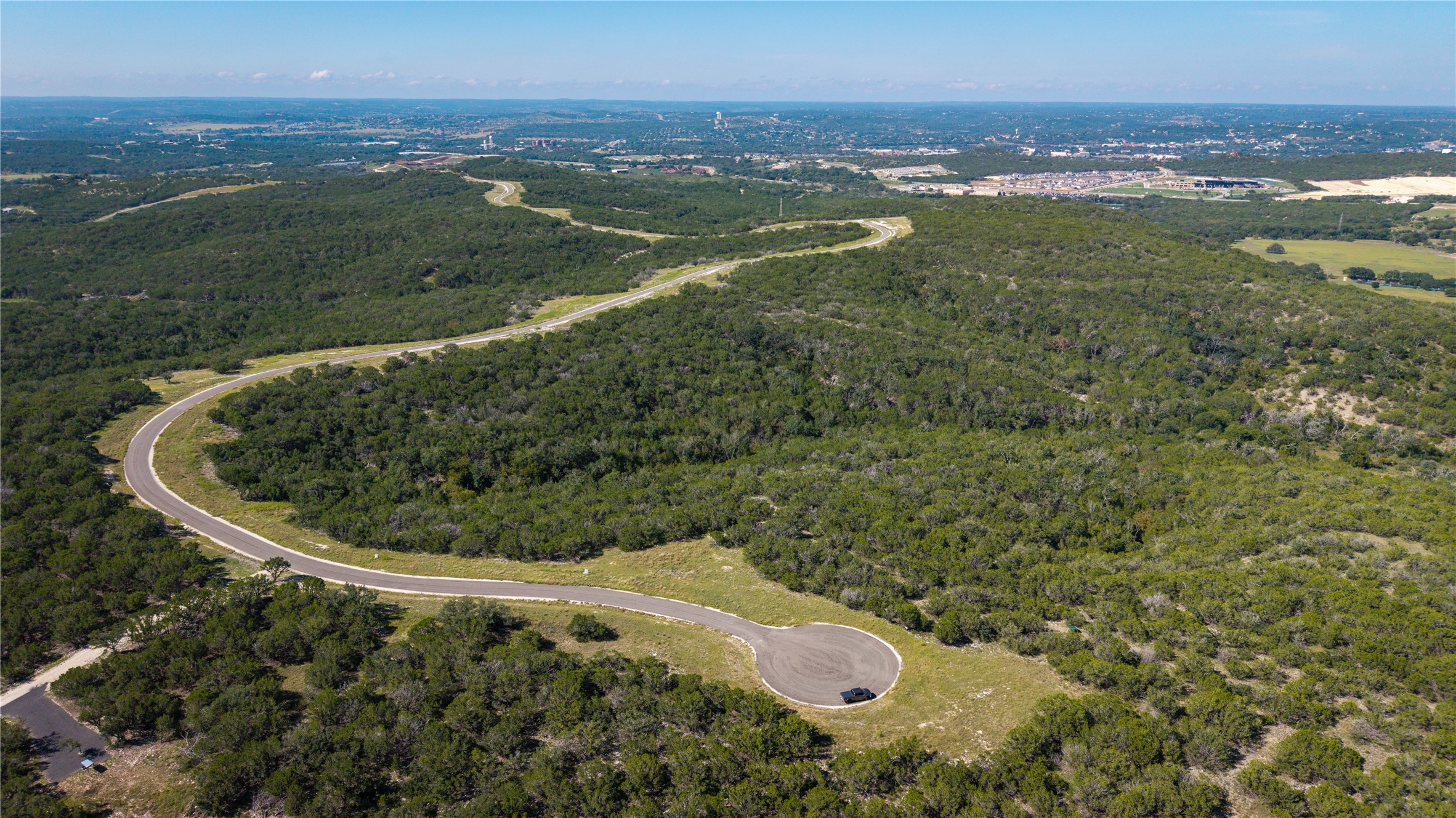 150 Henderson Branch Road West Ingram, TX 78025 - Photo 29 of 35 a view of a lake in middle of the town