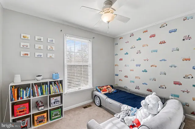 a bathroom with a granite countertop toilet a sink and a mirror