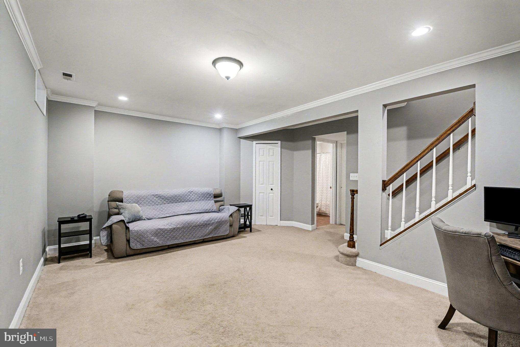 310 Talbot Court Abingdon, MD 21009 - Photo 17 of 24 a living room with furniture and stairs