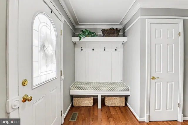 a view of balcony with wooden floor