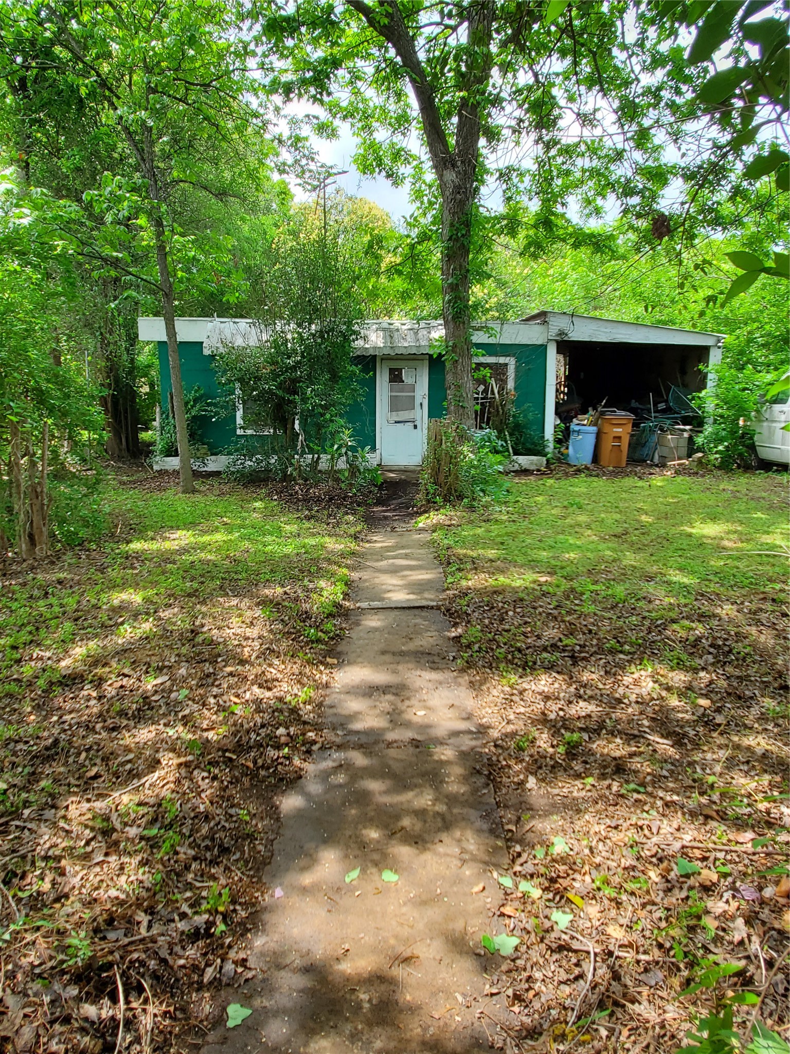 5512 Joe Sayers Avenue Austin, TX 78756 - Photo 3 of 19 a view of a house with a yard