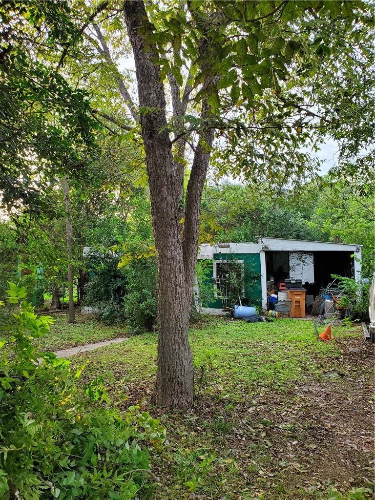 5512 Joe Sayers Avenue Austin, TX 78756 - Photo 10 of 19 a view of a house with a yard