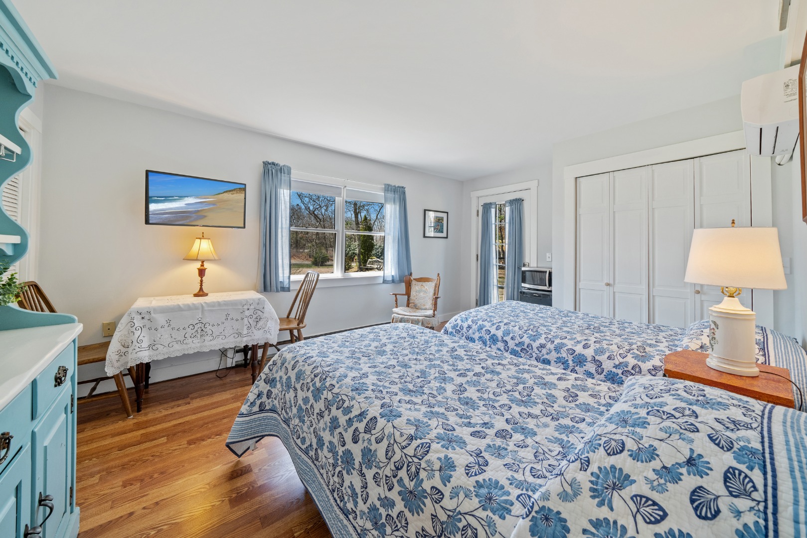 357 West Tisbury Road Edgartown, MA 02539 - Photo 7 of 33 a bedroom with a bed and wooden floor