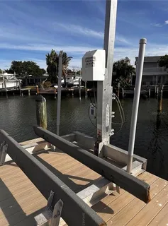 a view of a balcony with chairs