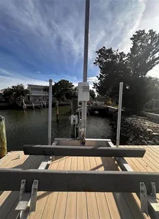 a view of a balcony with chairs