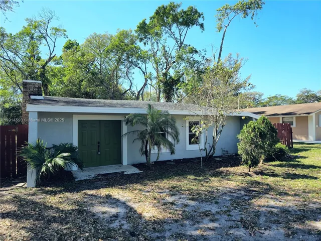 a view of house with outdoor space
