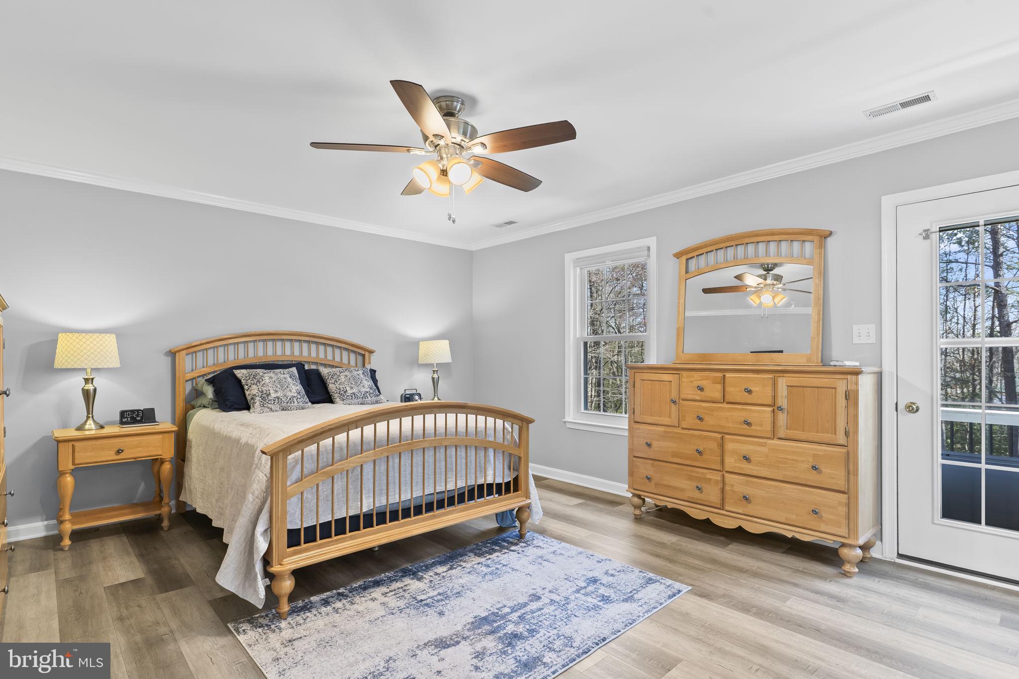 2132 Brians Way Lusby, MD 20657 - Photo 12 of 36 Serene bedroom with natural light.