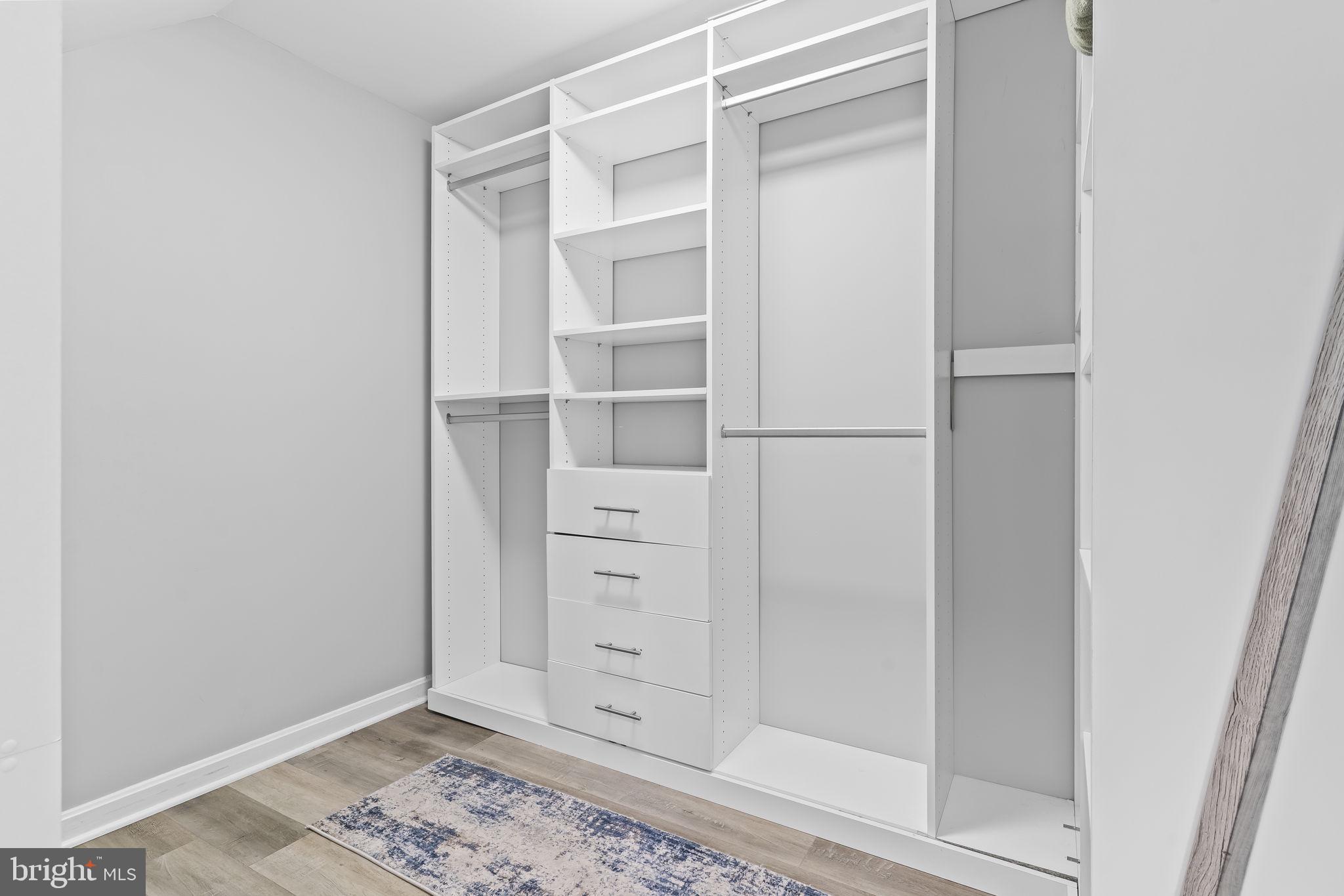 2132 Brians Way Lusby, MD 20657 - Photo 17 of 36 Sleek, modern closet design awaits you.