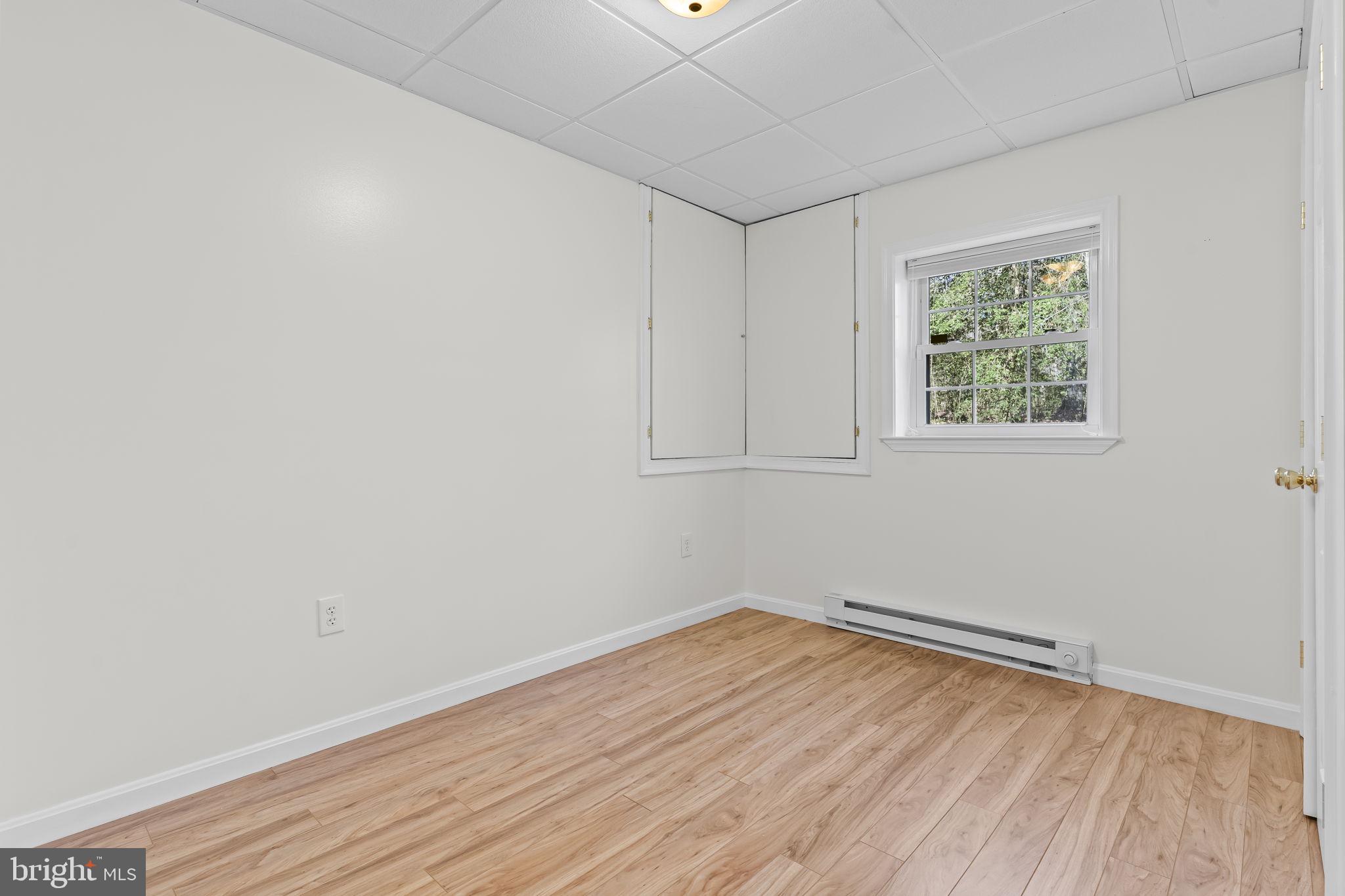 2132 Brians Way Lusby, MD 20657 - Photo 30 of 36 Bright and airy versatile space.