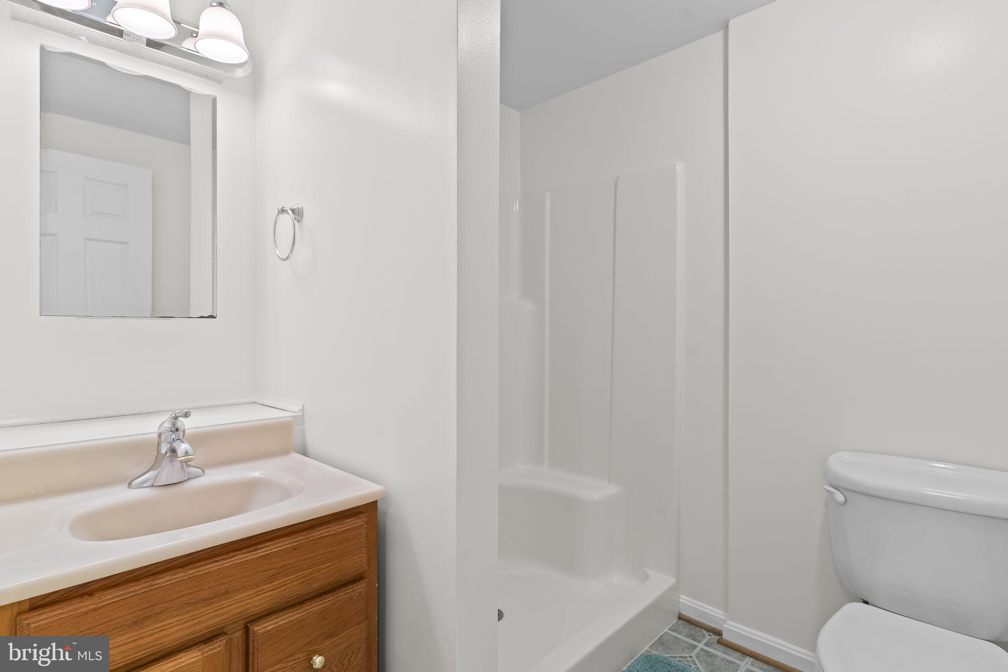 2132 Brians Way Lusby, MD 20657 - Photo 31 of 36 Bright and airy bathroom retreat.