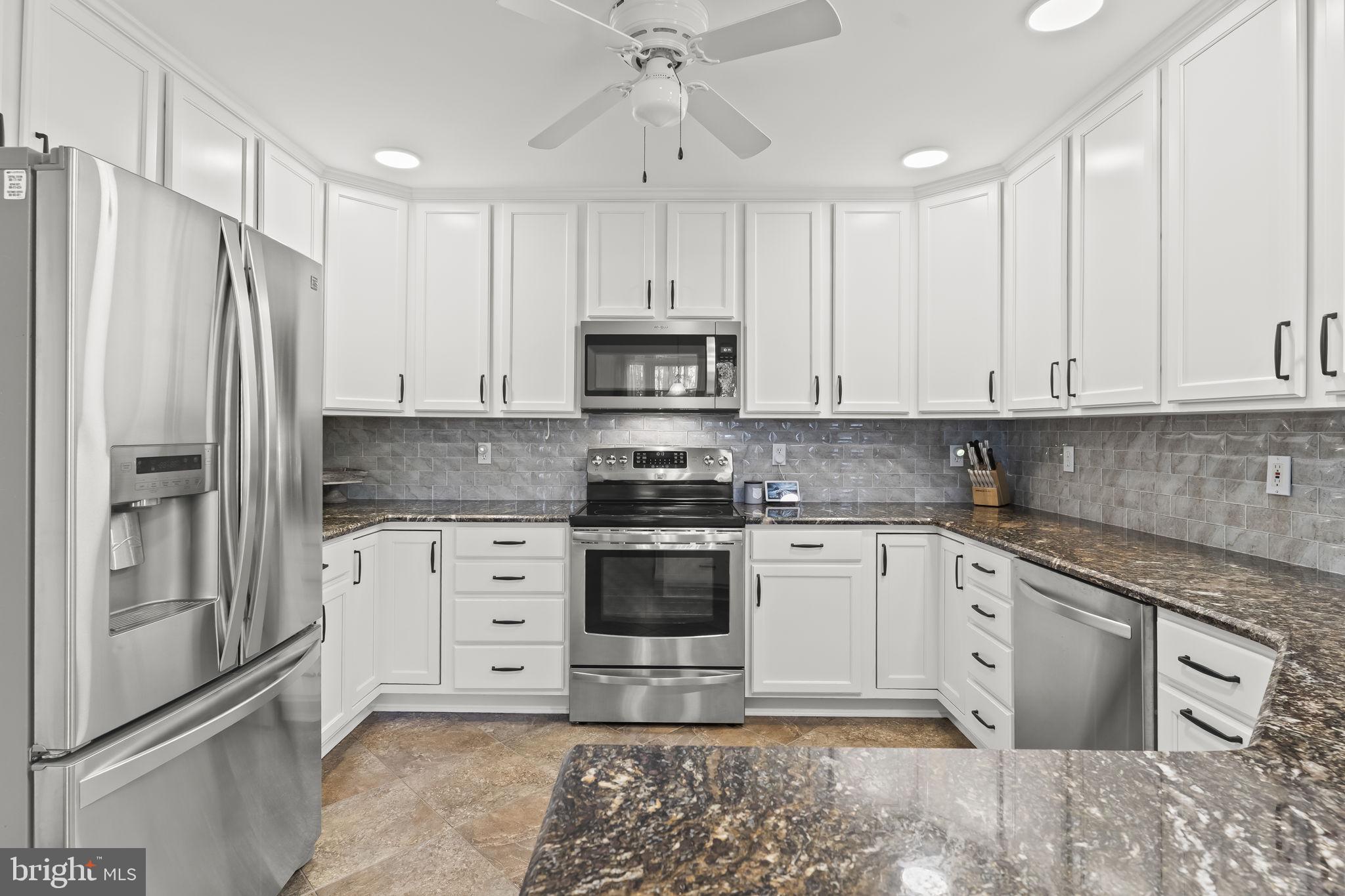 2132 Brians Way Lusby, MD 20657 - Photo 4 of 36 Modern elegance in a sleek kitchen.