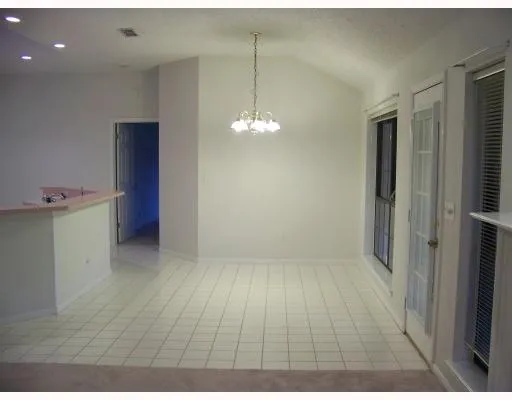 a view of a room with an empty space