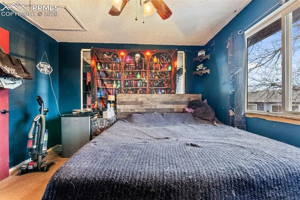 a view of a backyard with sitting area