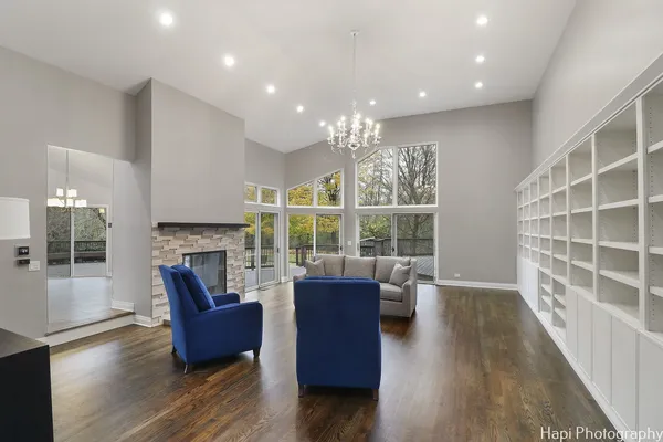 a view of a livingroom with furniture and a window