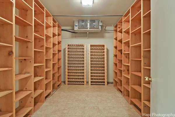 an empty room with a empty space and windows