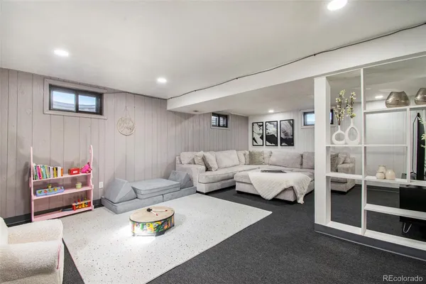 a living room with furniture and a table