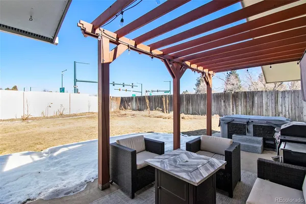 a outdoor space with patio the couches and pool table and chairs
