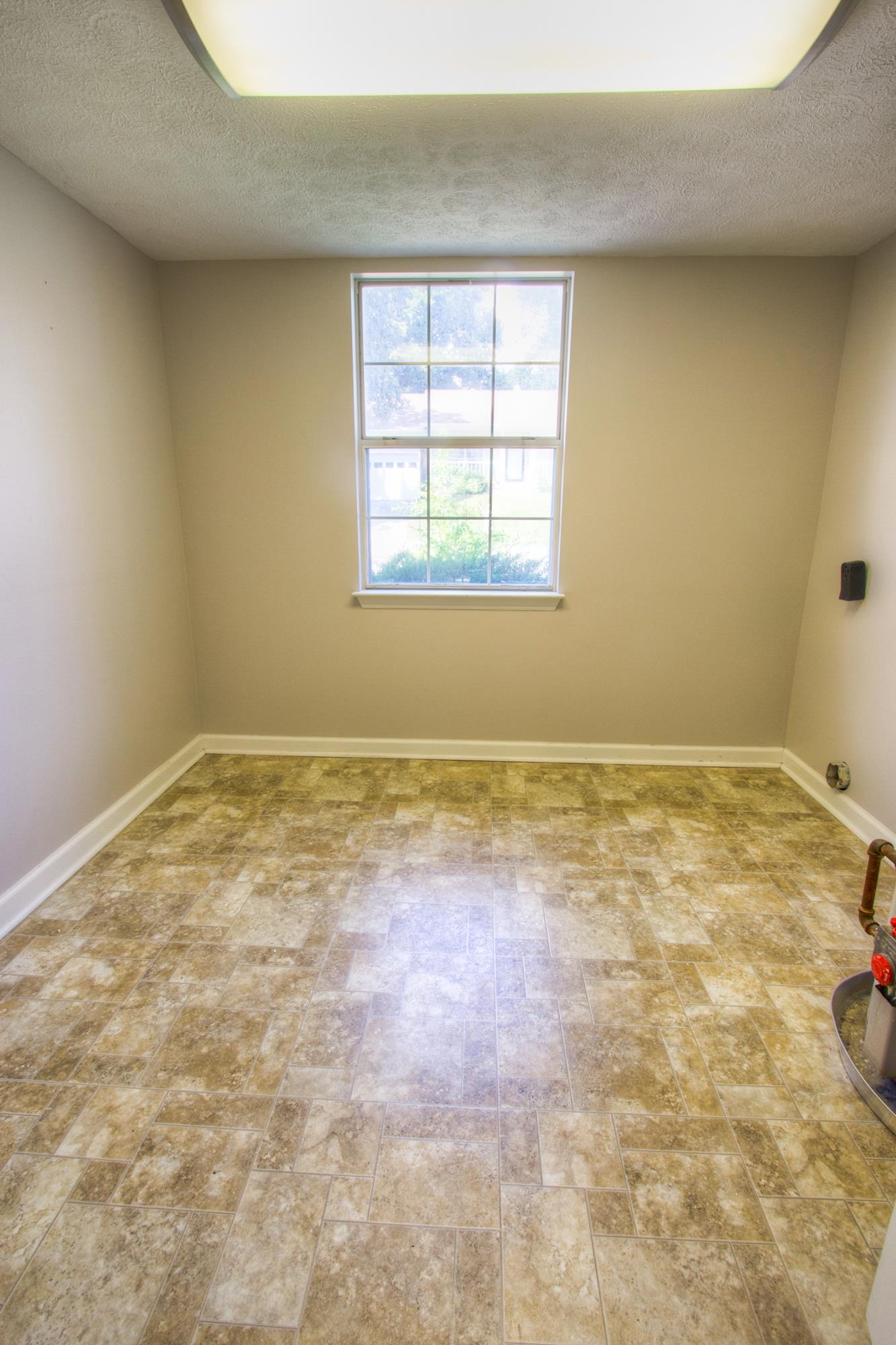884 Bishopsgate Road Antioch, TN 37013 - Photo 8 of 12 an empty room with a window