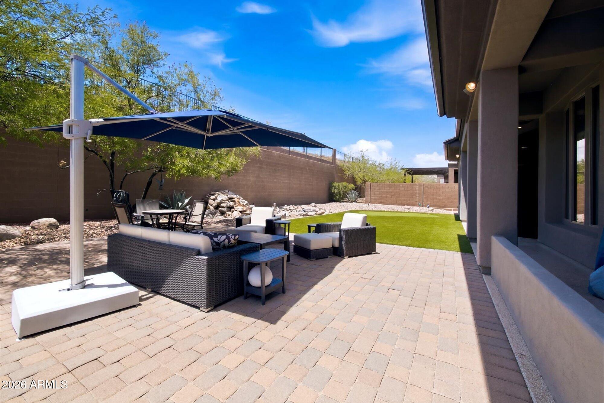 41606 North Anthem Ridge Drive Phoenix, AZ 85086 - Photo 29 of 52 29-pavered back yard patio