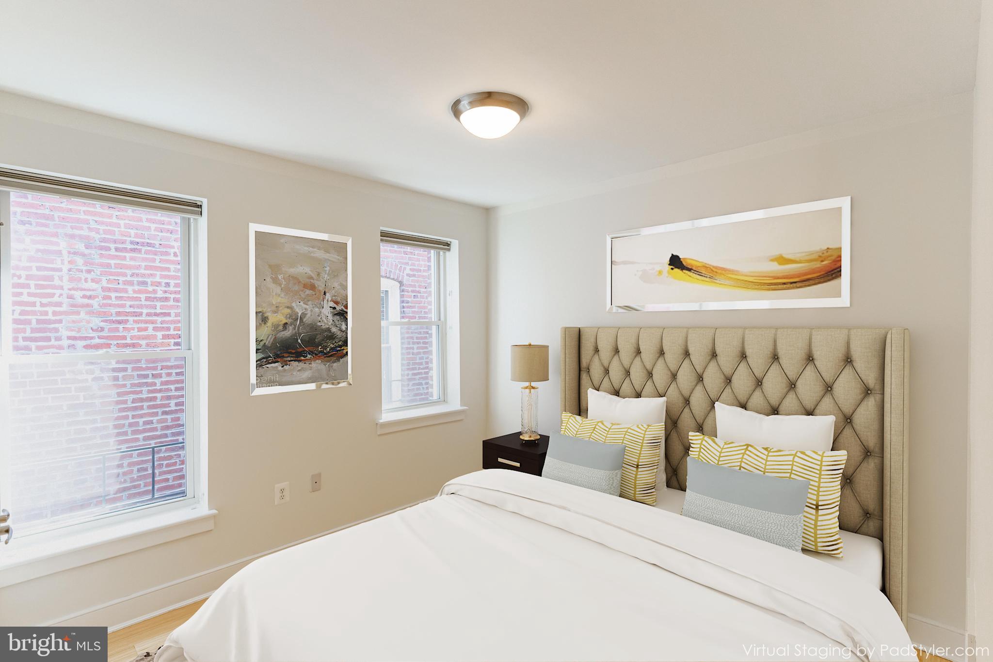 1108 Columbia Road Northwest, Unit 301 Washington, DC 20009 - Photo 11 of 20 Owner's bedroom with virtual staging