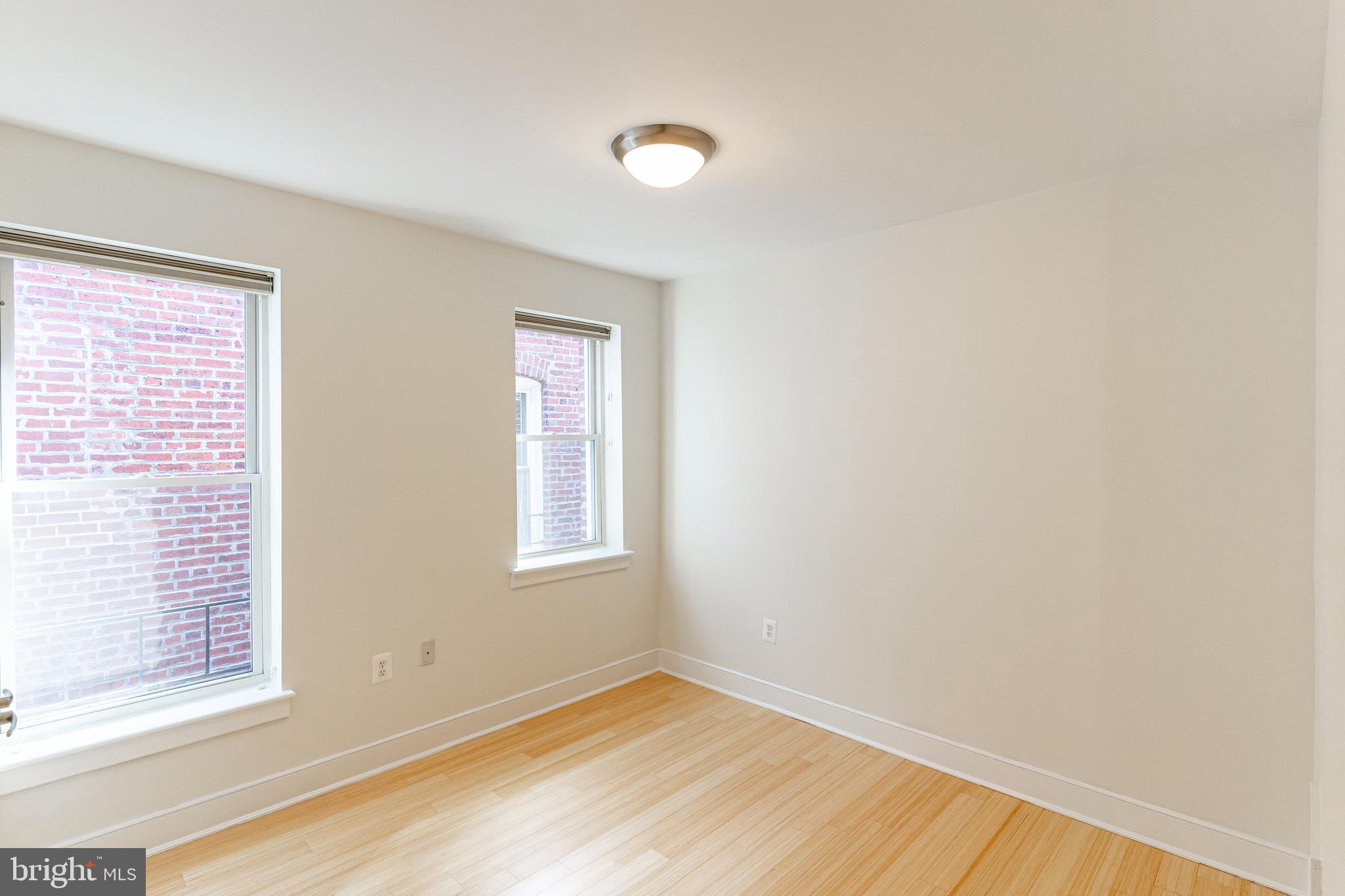 1108 Columbia Road Northwest, Unit 301 Washington, DC 20009 - Photo 12 of 20 Owner's bedroom has great light