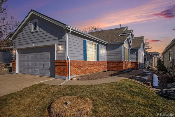 a backyard of a house with yard and garage