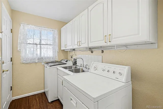 a utility room with dryer and washer