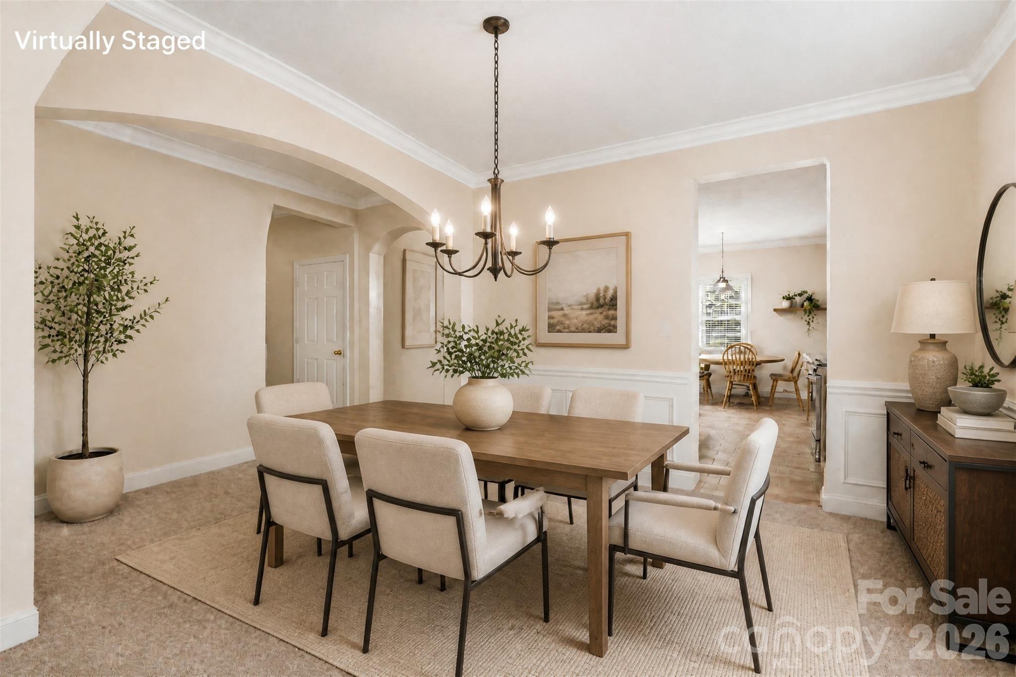 3035 Proverbs Court Monroe, NC 28110 - Photo 10 of 30 a dining room with furniture and chandelier