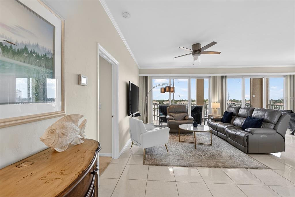 2060 Matecumbe Key Road, Unit 2506 Punta Gorda, FL 33955 - Photo 3 of 38 a living room with furniture and a large window