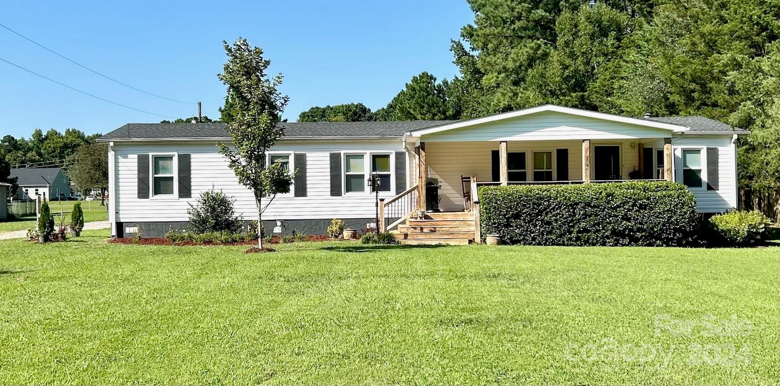 3250 Ferguson Long Road York, SC 29745 - Photo 1 of 32 a front view of a house with a yard