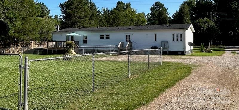 3250 Ferguson Long Road York, SC 29745 - Photo 12 of 32 a view of a house with backyard and sitting area
