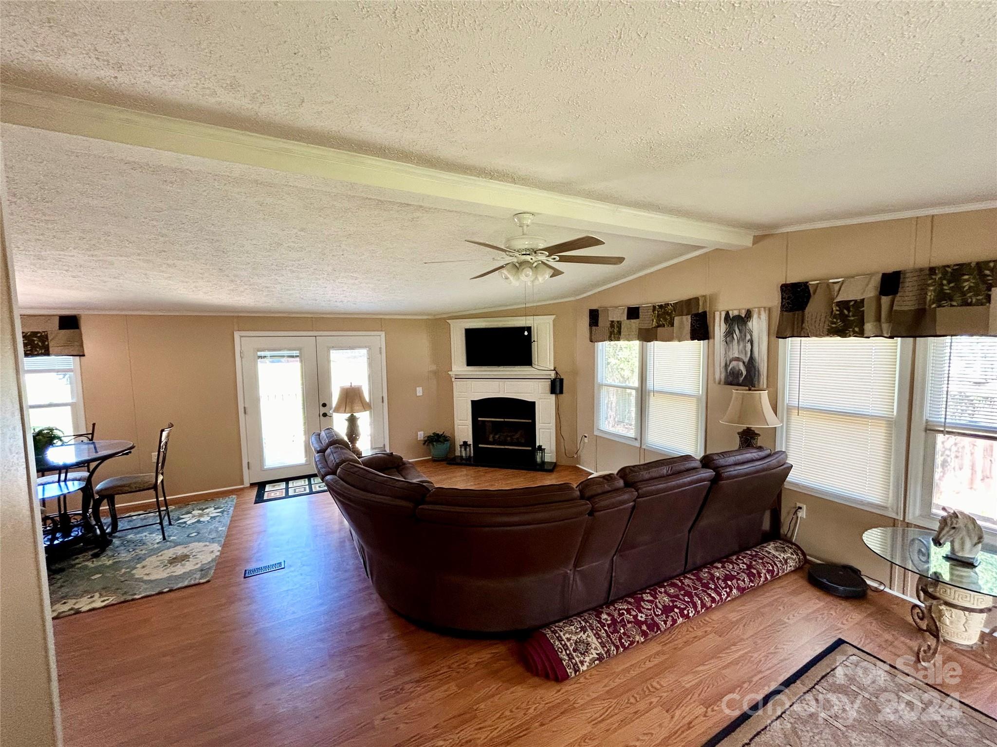 3250 Ferguson Long Road York, SC 29745 - Photo 13 of 32 a living room with furniture fireplace and flat screen tv