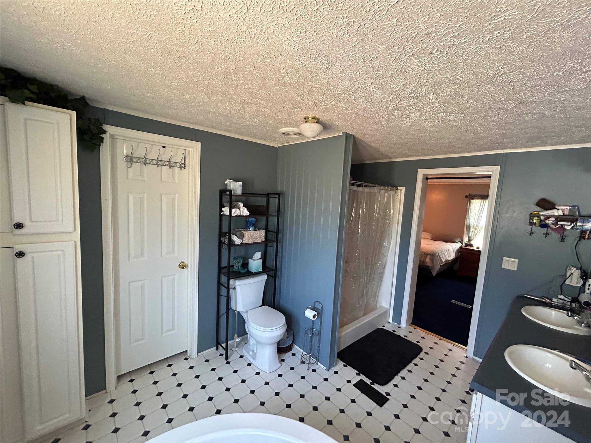 3250 Ferguson Long Road York, SC 29745 - Photo 24 of 32 a bathroom with a sink toilet and shower