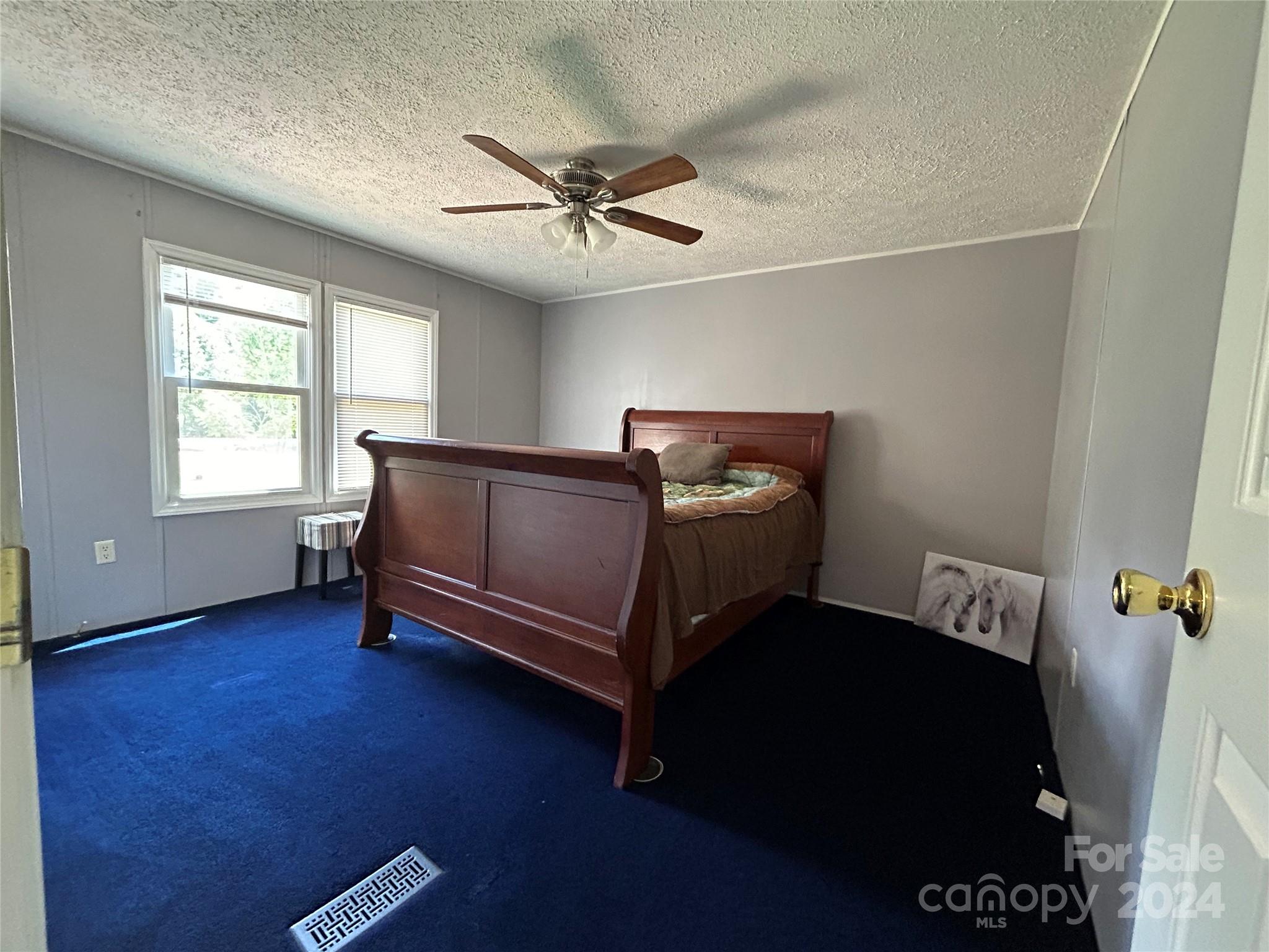 3250 Ferguson Long Road York, SC 29745 - Photo 26 of 32 a bed room with a bed and a window