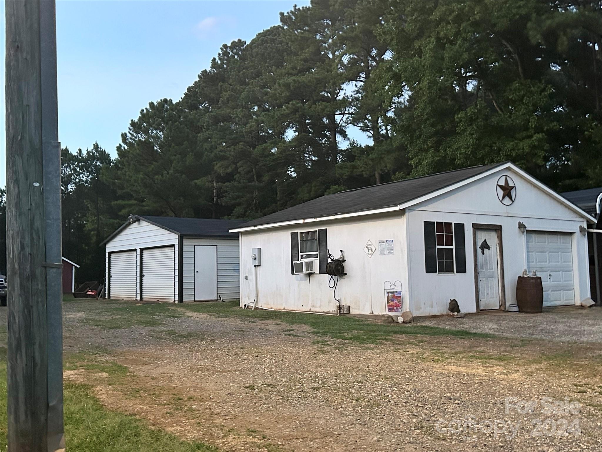 3250 Ferguson Long Road York, SC 29745 - Photo 30 of 32 a front view of a house with garden