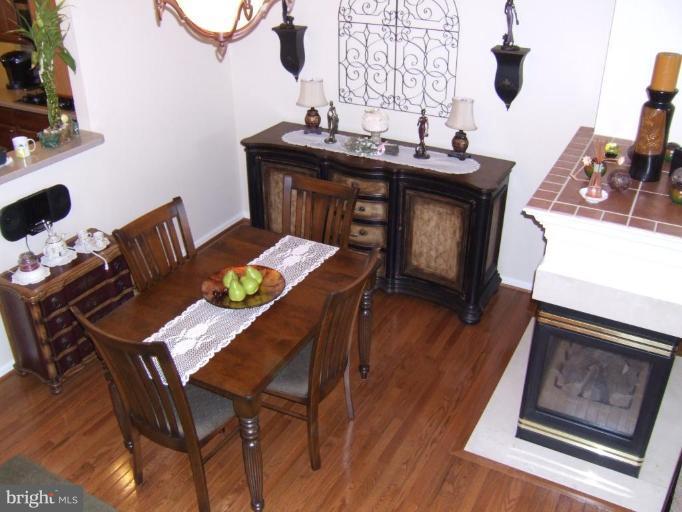4401 Summer Grape Road, Unit 4401 Pikesville, MD 21208 - Photo 8 of 28 double sided gas fireplace
