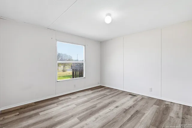 an empty room with a window