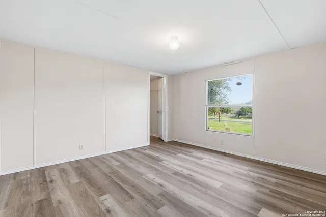 an empty room with window