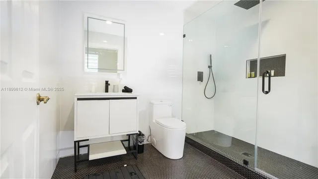 a bedroom with bed and lamp