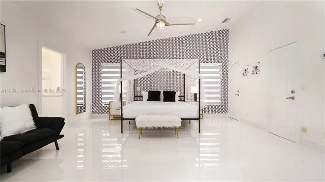 a bathroom with a bathtub a shower a sink and a window