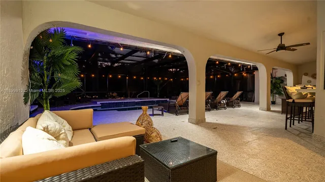 a view of swimming pool with a patio