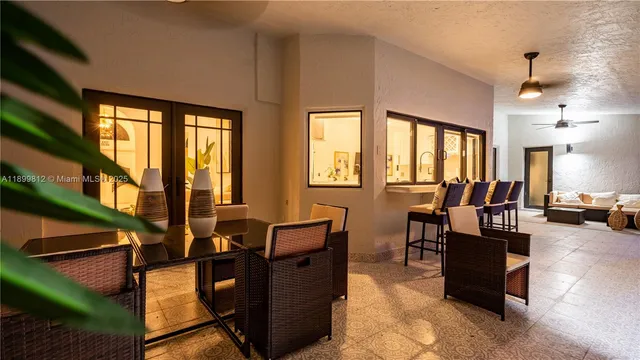 a view of a swimming pool with a patio