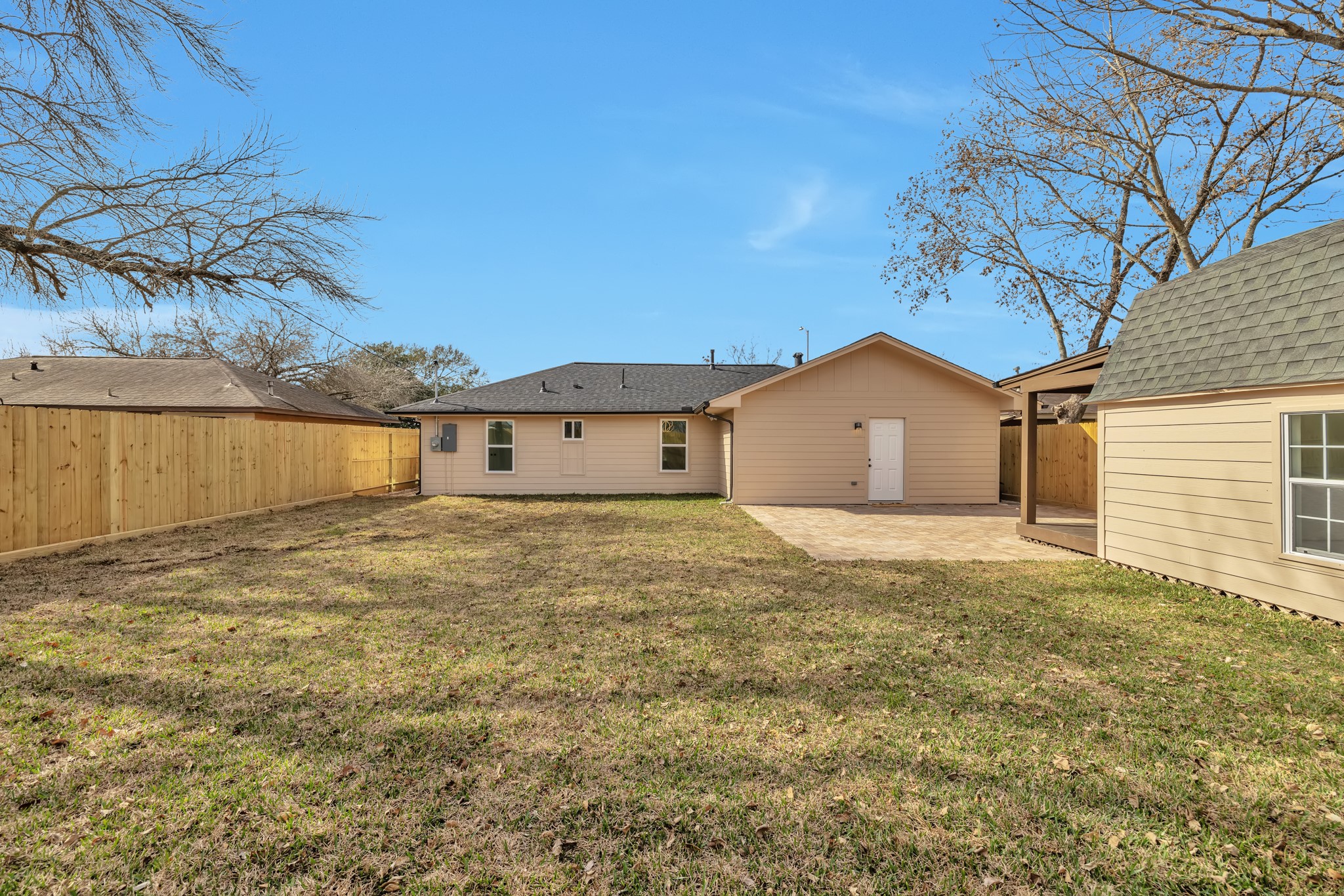 8709 Tarbell Road Houston, TX 77034 - Photo 19 of 25 a house view with a backyard space