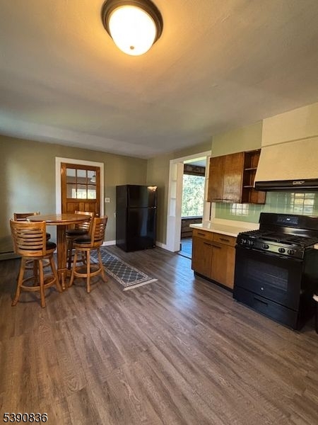 11 Mt Bethel Road Hackettstown, NJ 07840 - Photo 4 of 23 a kitchen with a table chairs and a wooden floor